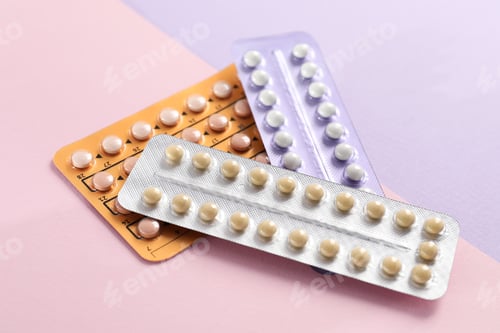 Preview: Blisters of contraceptive pills on color background, closeup