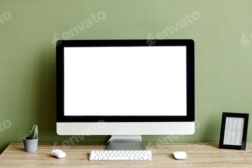 Preview: Mockup Computer Screen on Green Wall