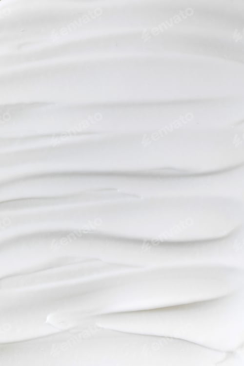Preview: Close-up texture of white moisturizing cream. Full frame. Skin care