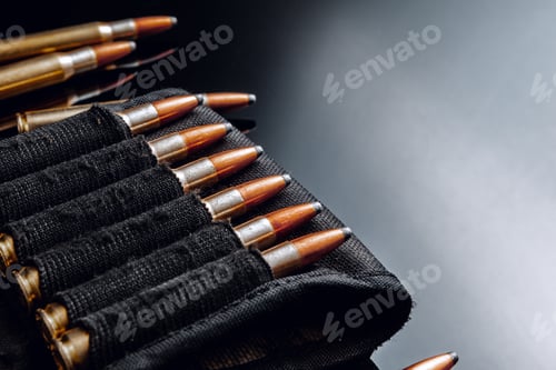 Preview: Rifle bullets or cartridges on black shiny background