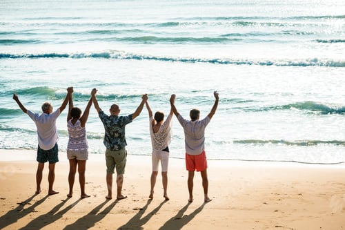 Preview: Senior friends having fun at the beach