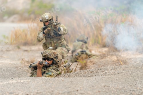 Preview: Group of military or soldiers hold the gun and point to the front and ready to fight with enemy