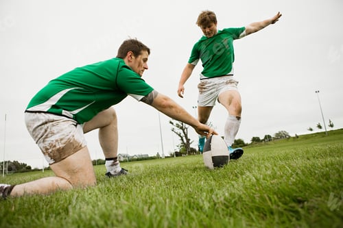 Preview: Rugby player kicking ball