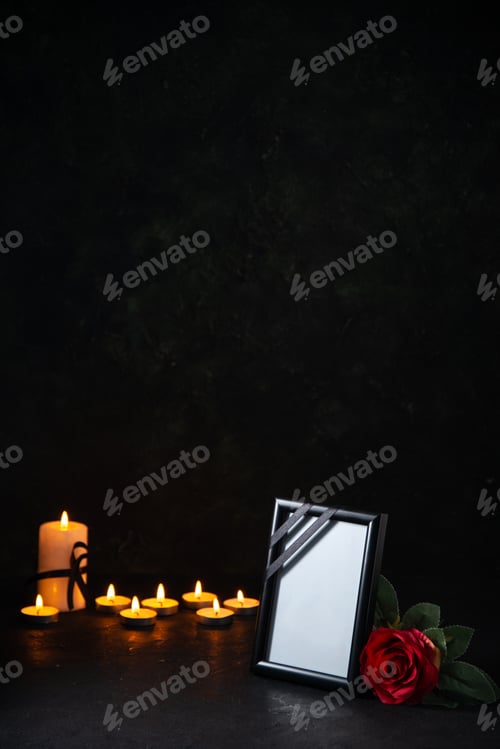 Preview: front view of burning candles with picture frame on a dark surface death war evil funeral
