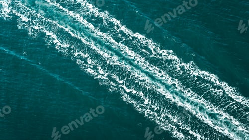 Preview: Beautiful shot of a boat trace in the water.