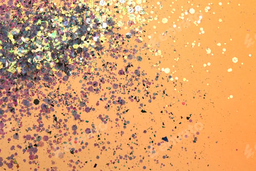 Preview: Shiny bright violet glitter on beige background, flat lay