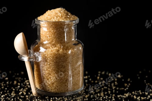 Preview: Glass jar filled with granulated brown sugar