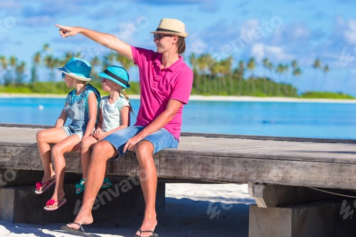 Preview: Dad with Daughters Enjoying Tropical Beach Vacation