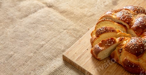 Preview: Easter sweet bread, greek tsoureki, brioche braid slice on table, close up view