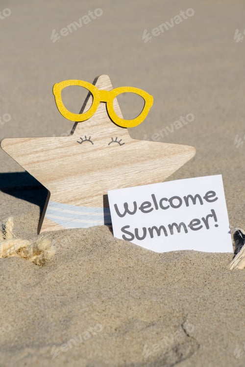 Preview: WELCOME SUMMER text on paper greeting card on background of funny starfish in glasses summer