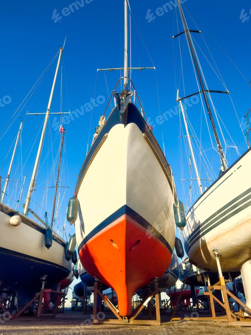 Preview: A view of the yachts at the dock. Sailing yachts parked in the marina. Maritime transportation.