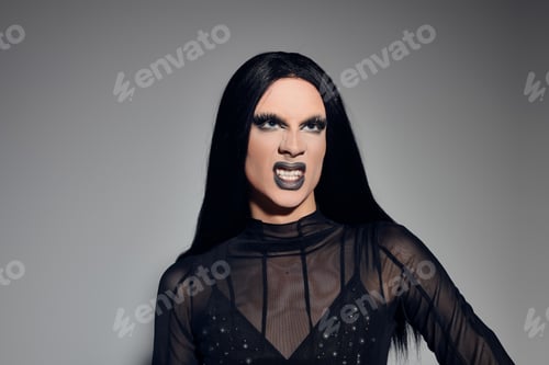 Preview: A stylish drag queen flaunts fashion in a striking black outfit during a shoot