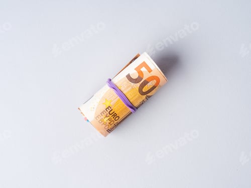 Preview: Euro 50 value banknotes roll with rubber on gray background