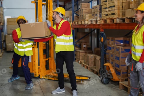 Preview: Warehouse working people move boxes - Industrial occupation concept - Focus on center man face