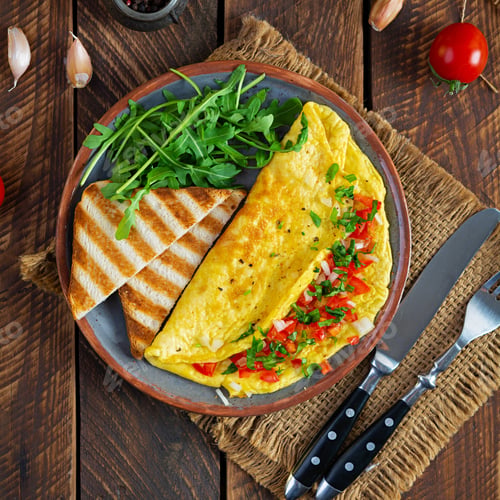 Preview: Fried omelette with tomatoes, onion and herbs. Delicious breakfast with eggs and toasts. Top view