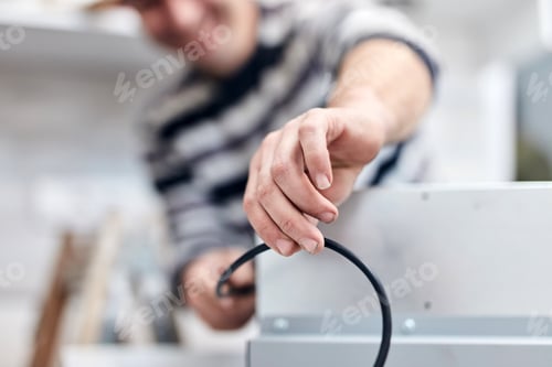 Preview: Handyman Worker Fixing And Assembling Household Furniture.