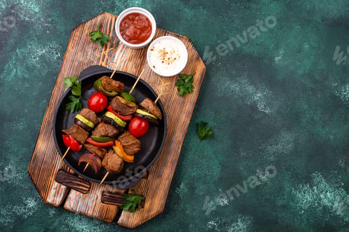 Preview: Grilled kebabs with meat, mushrooms and vegetables
