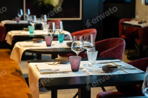 Preview: Elegant table setting. Sophisticated intimate event tables featuring vibrant glassware