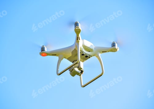 Preview: drone quad copter with digital camera on the sky