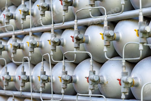Preview: A lot of bottles filled with gas or gasoline are stacked in piles