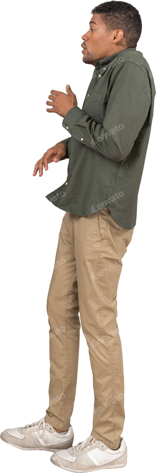Preview: a man wearing khaki pants and a green jacket and white shoes
