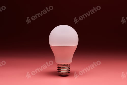 Preview: Light bulb, copy space. Energy saving minimal idea concept.Pink background.