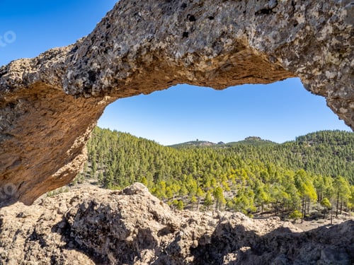 Preview: Nublo Window arch (Ventana de Nublo) and forest surroundings, Grand Canary island, Spain.
