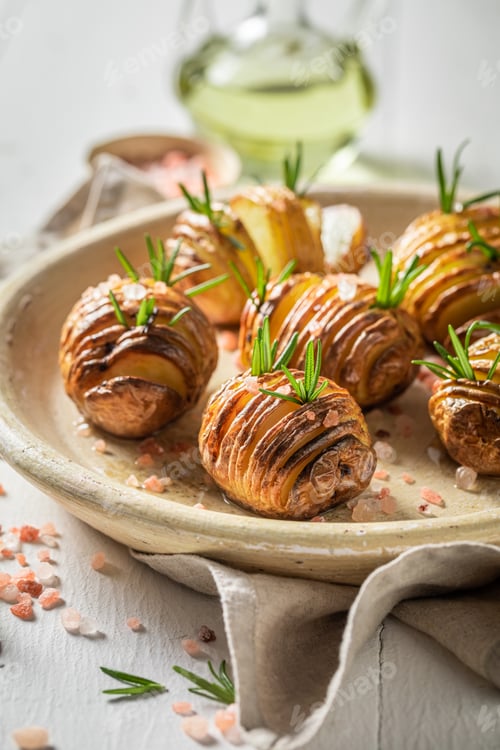 Preview: Delicious baked potatoes with herbs and oil. Swedish cuisine.