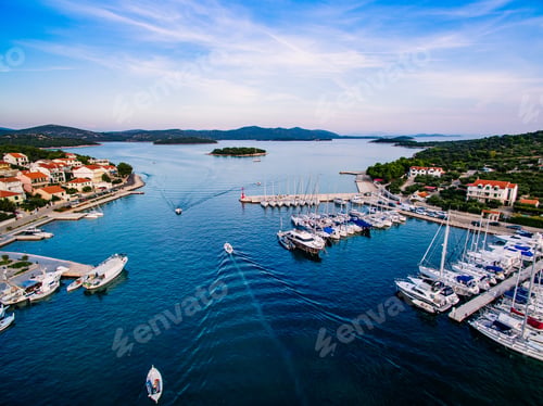Preview: Aerial drone view of small marina with boats and yachts docked in Croatia
