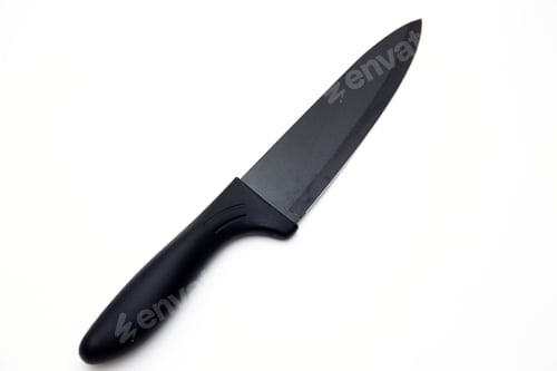 Preview: Top view of a black matte sharp knife isolated in white
