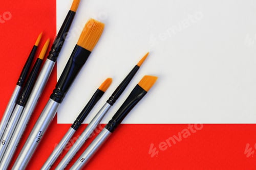 Preview: a set of brushes for drawing on a red background. synthetic brushes for watercolor, gouache, acrylic