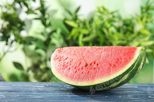 Preview: Fresh juicy watermelon with seeds on wooden table