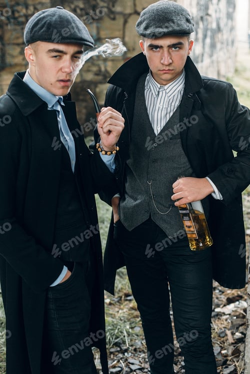 Preview: Posing on background of railway with bottle of alcohol