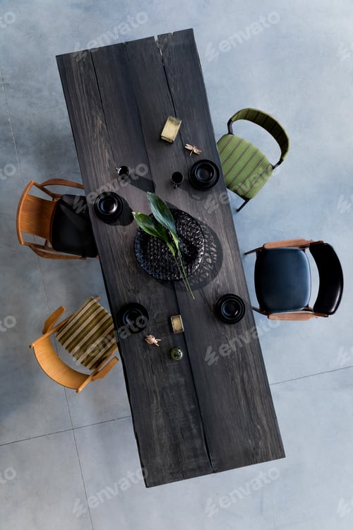 Preview: Elegant dining room interior composition with wooden dining table and vintage chairs.