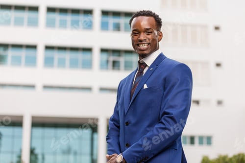 Preview: Outdoor standing portrait of a black African American business m