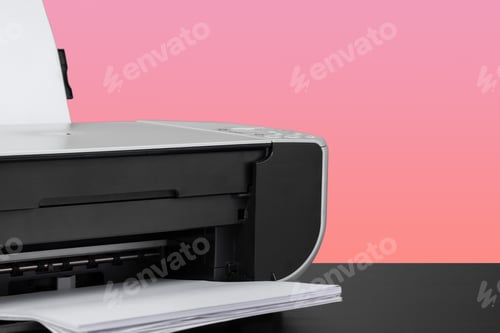 Preview: Compact home laser printer against pink background