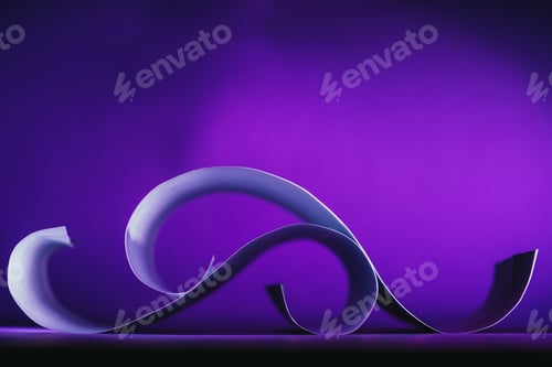 Preview: white paper on each other on dark purple
