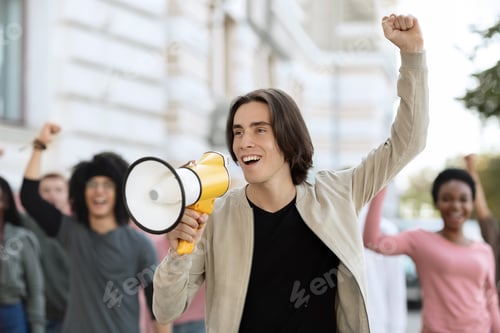 Preview: Charismatic guy activist with megaphone on the street