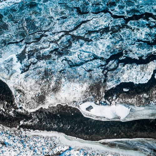 Preview: Top down view of melting ice on river in winter