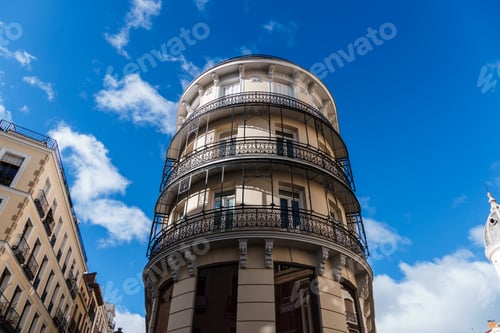 Preview: Low angle view of old residential building in central Madrid against sky