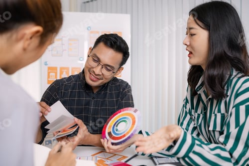 Preview: A group of UX/UI designers brainstorming creative ideas together