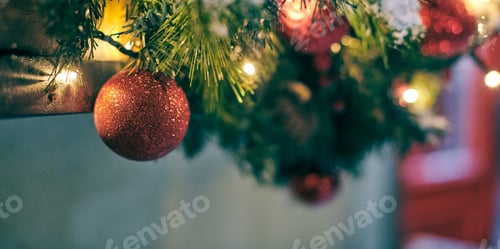Preview: Christmas tree bulbs with yellow garlands covered snow, outdoor xmas tree with decorative red bulbs