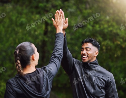 Preview: Active,fit and sporty athletes doing a high five to celebrate, cheer and congratulate on reach fitn