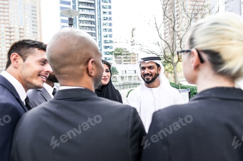 Preview: Mixed business team making agreements on future business plans