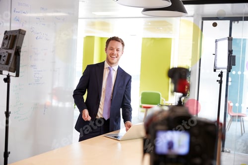 Preview: Young white man making a corporate demonstration video