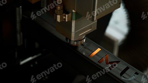 Preview: Laser cut head machine while cutting the sheet metal with the sparking light in factory. Creative