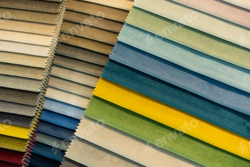 Preview: Catalog of multi-colored fabric samples. Textile industry background. Tissue catalog