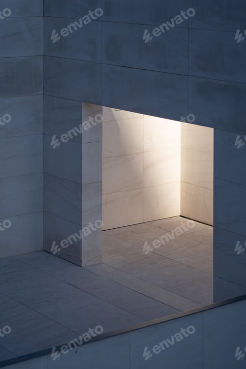 Preview: Illuminated space with textured building walls.