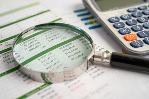 Preview: Magnifying glass on spreadsheet and calculator. Financial development, Banking Account, Statistics,