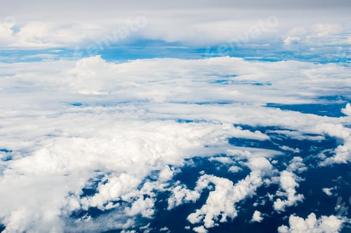 Preview: blue sky with the clouds from the plane view